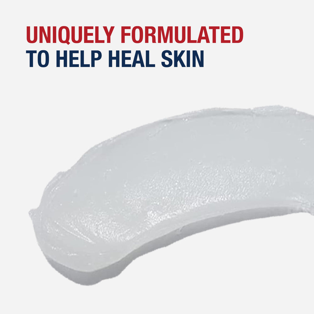 Aquaphor ointment texture in open jar, shows smooth petrolatum formula for hydration