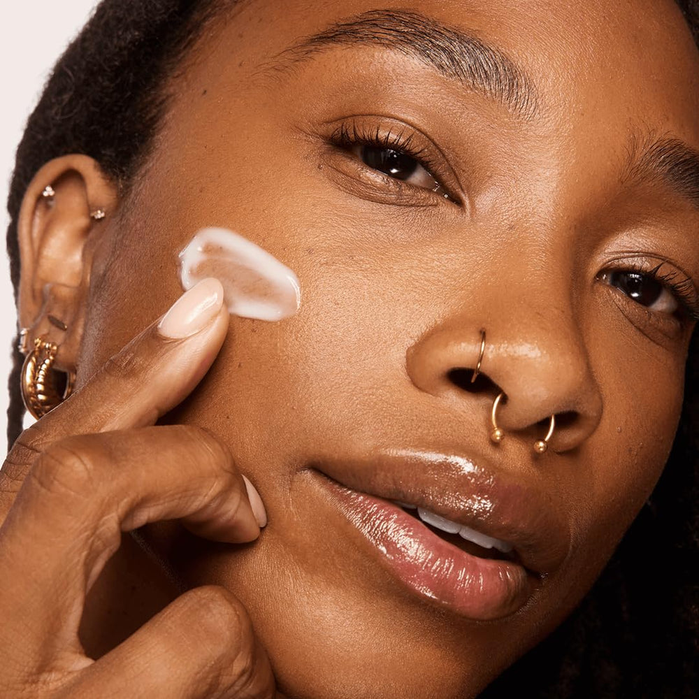 Aramore NAD+ Treatment texture closeup reveals creamy, fragrance-free formula for sensitive skin.