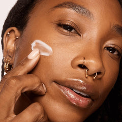 Aramore NAD+ Treatment texture closeup reveals creamy, fragrance-free formula for sensitive skin.