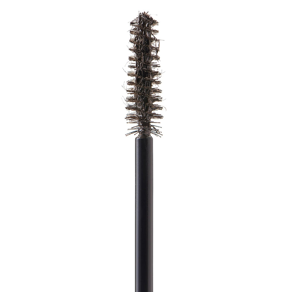 Arches & Halos brow mousse spoolie application shows even tint distribution for natural brows.