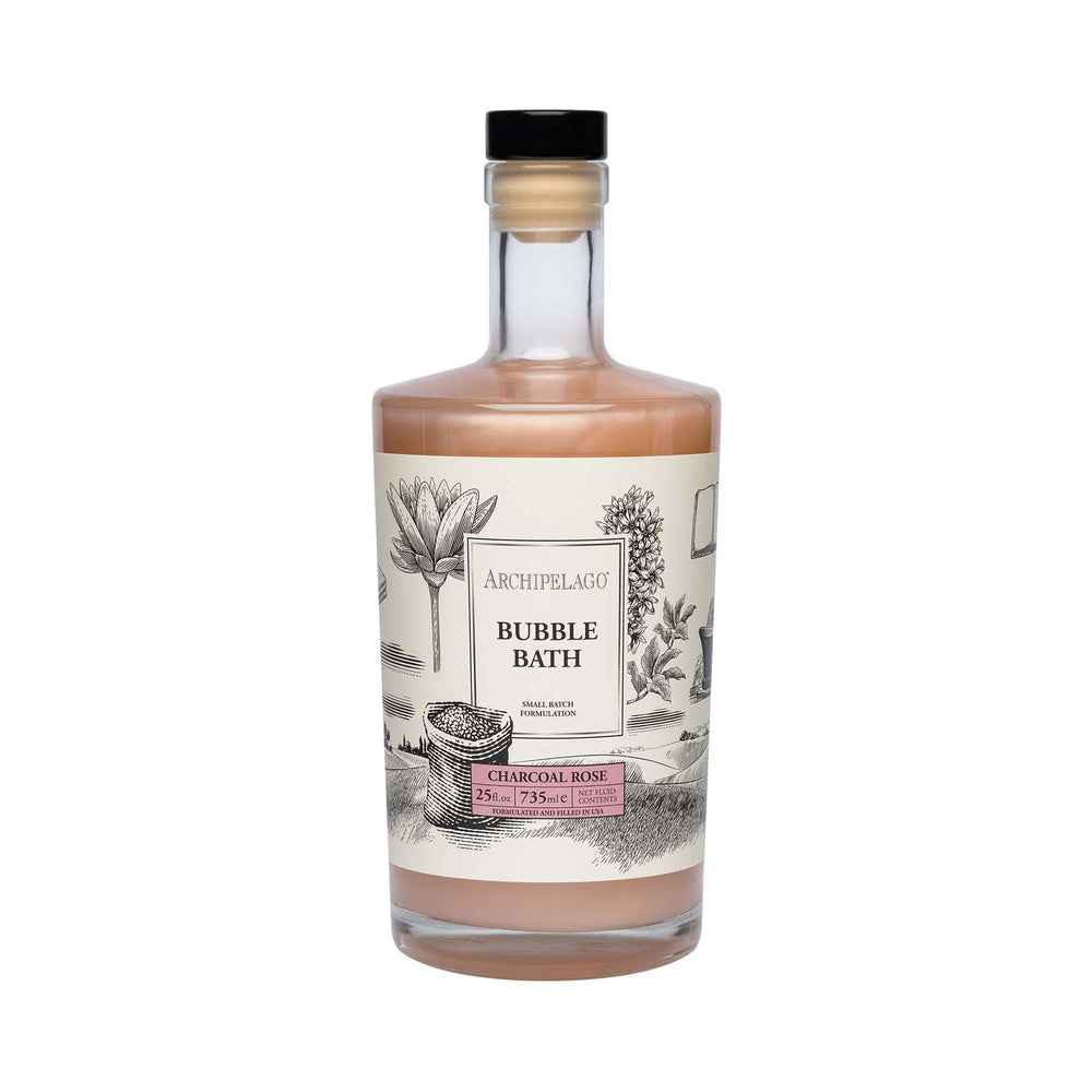 Archipelago Botanicals Luxury Charcoal Rose Bubble Bath bottle pour invites a calming detox ritual.