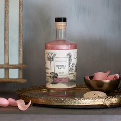 Archipelago Botanicals Charcoal Rose Bubble Bath bubbles rise for a hydrating spa-like soak.