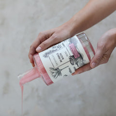 Archipelago Botanicals Charcoal Rose Bubble Bath texture close-up showcases detoxifying charcoal.