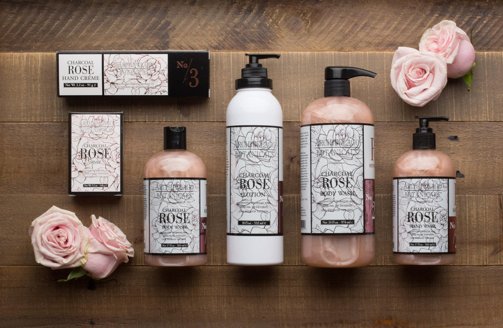Archipelago Botanicals Charcoal Rose Lotion texture swirl reveals silky, non-greasy finish.