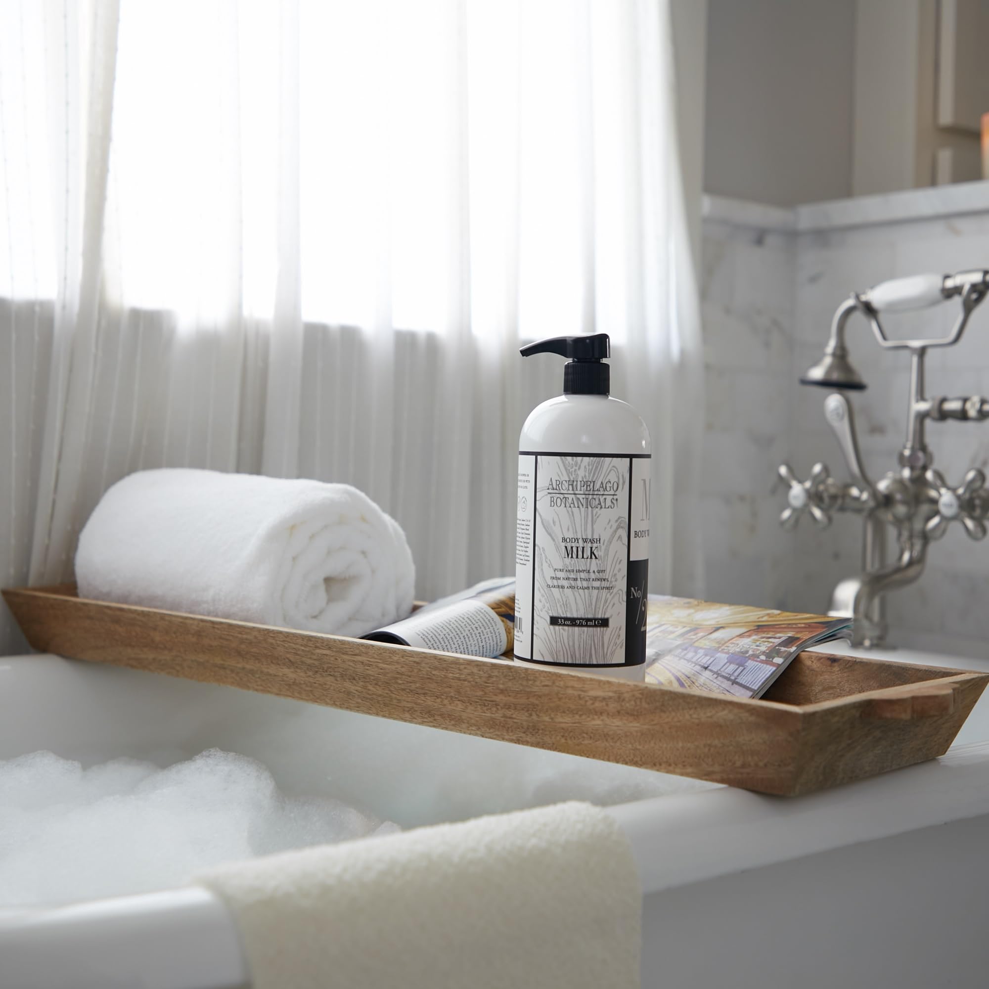 Archipelago Botanicals Milk Body Wash foam closeup highlights creamy texture for sensitive skin