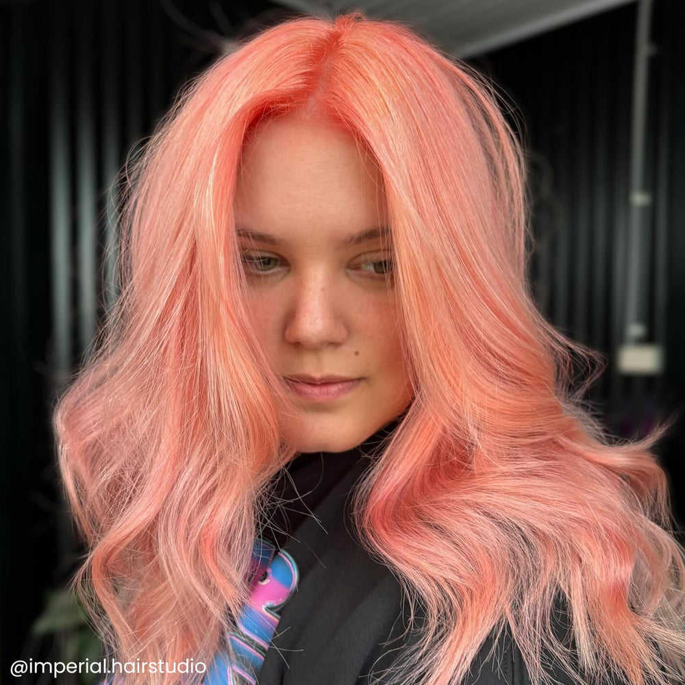 ARCTIC FOX Pastel Peach Prosecco on platinum hair shows even coverage and soft shine.