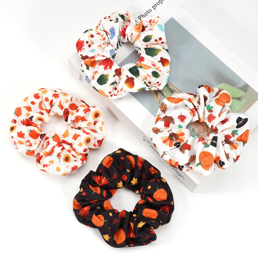 Ardorchid maple-leaf scrunchie offers soft comfort for autumn looks.