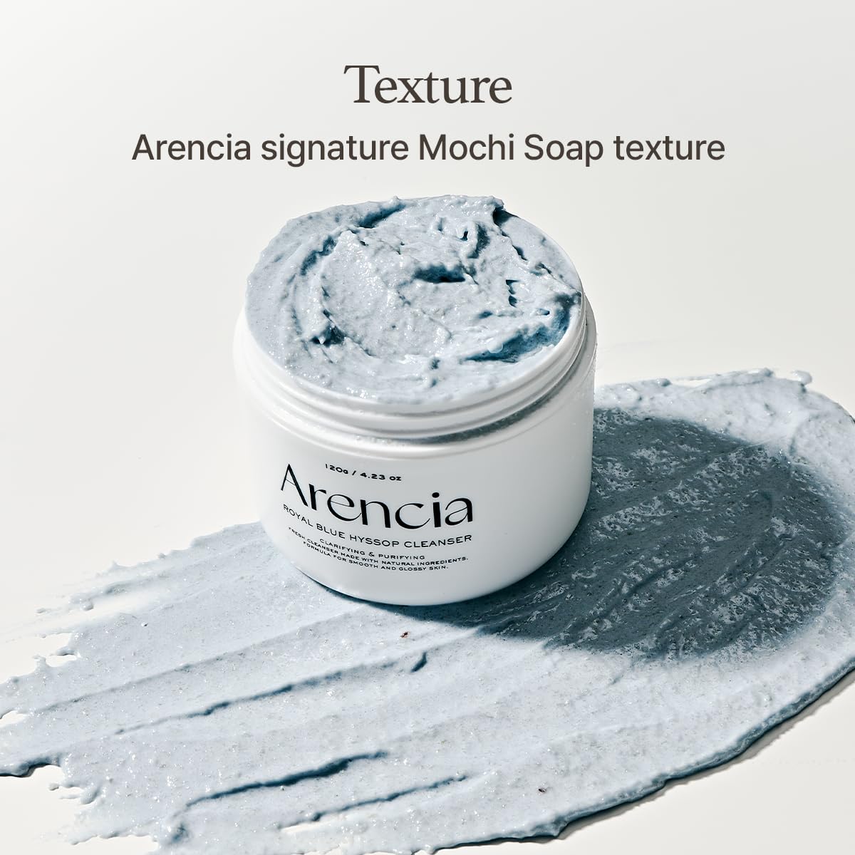 ARENCIA hyssop brightening scrub exfoliation closeup shows micro beads and natural scent.
