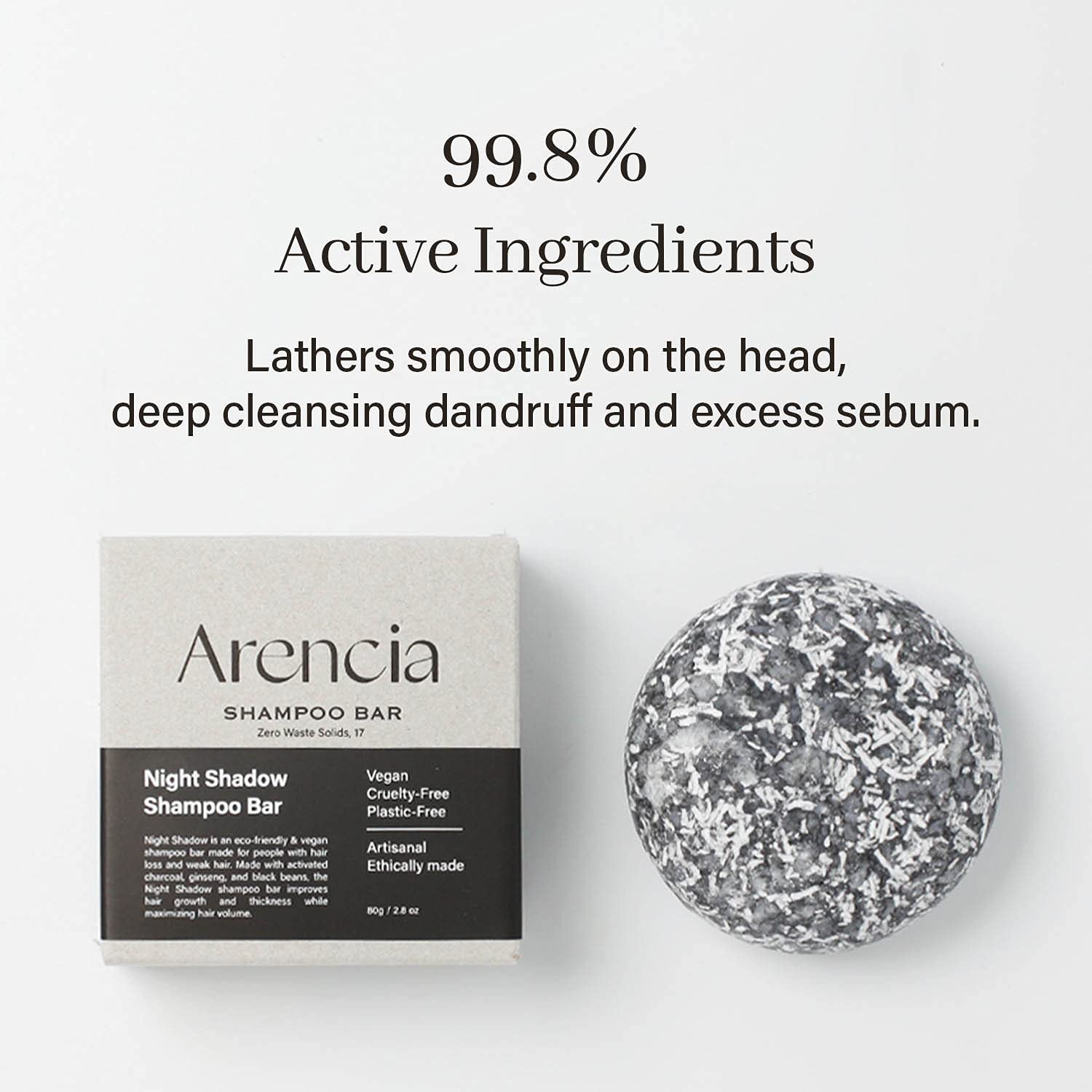 ARENCIA Night Shadow shampoo bar in hand; shows lather-ready cleansing.