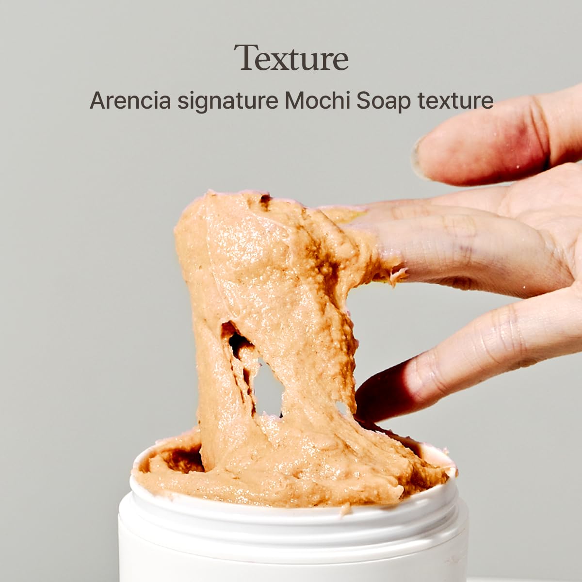 Creamy foam forming a soft lather with ARENCIA Calendula Rice Mochi Cleanser
