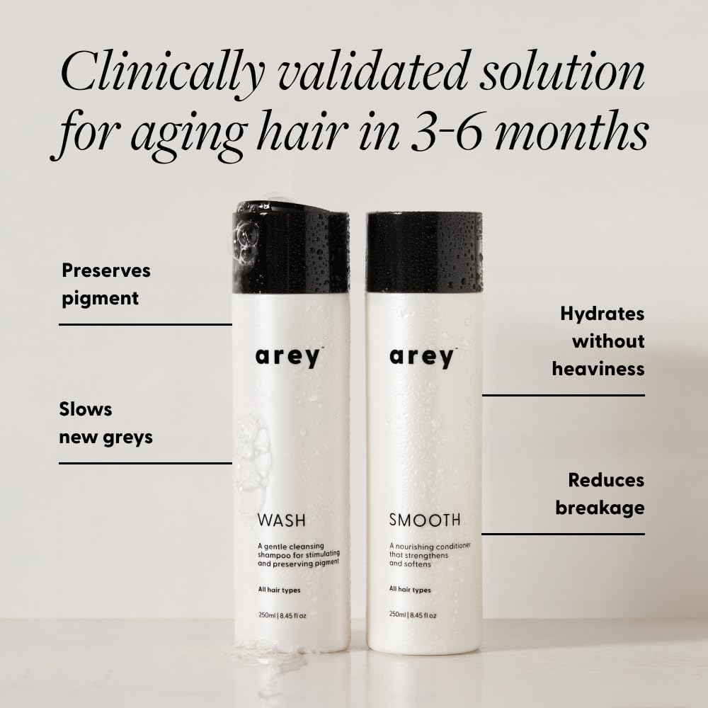 Arey Shower Duo shampoo bottle close-up shows sulfate-free formula for color-treated hair