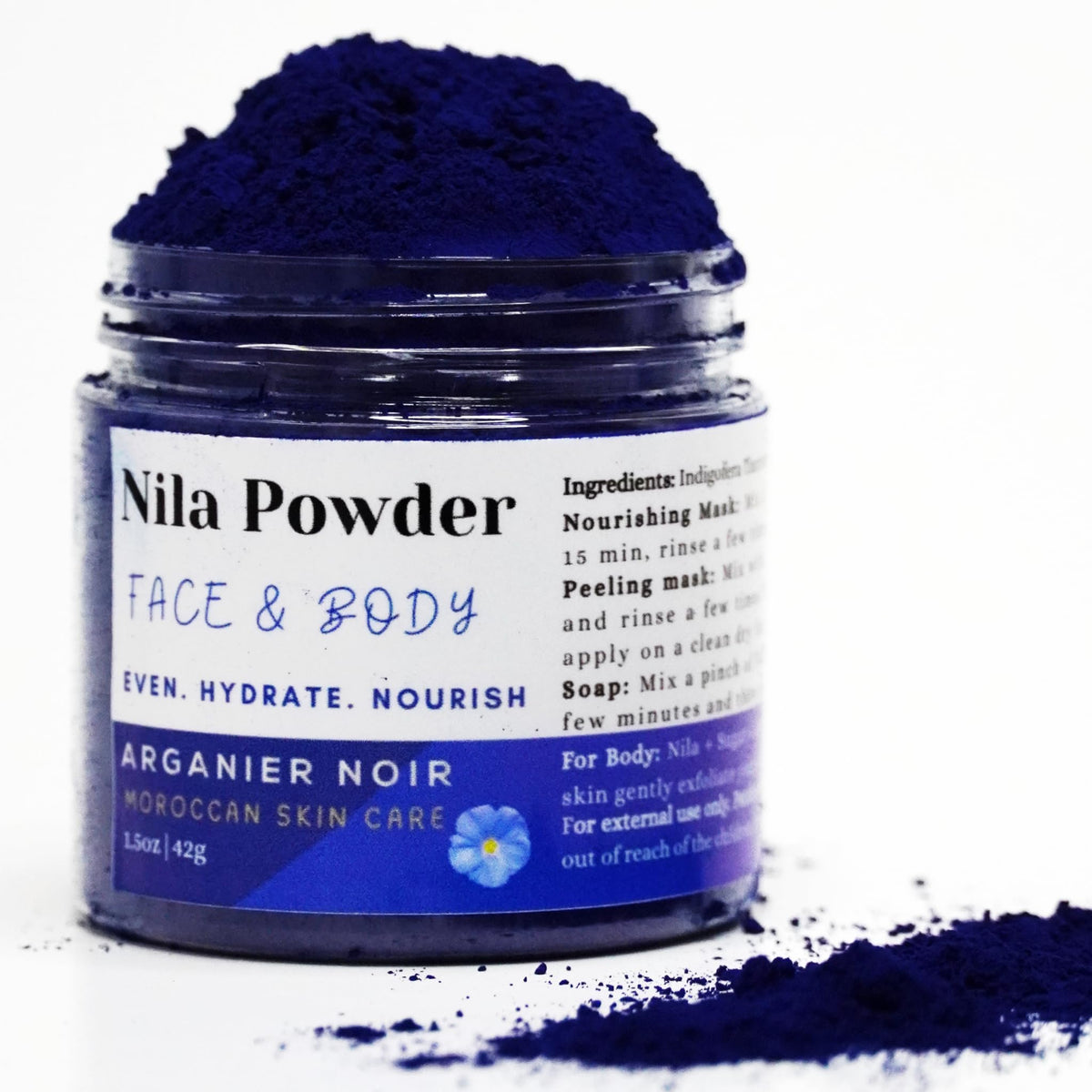 Arganier Noir Nila powder tin closeup highlighting premium blue nila for cleansing