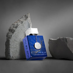 Armaf Club De Nuit Iconic Blue label close-up emphasizing premium fragrance notes.
