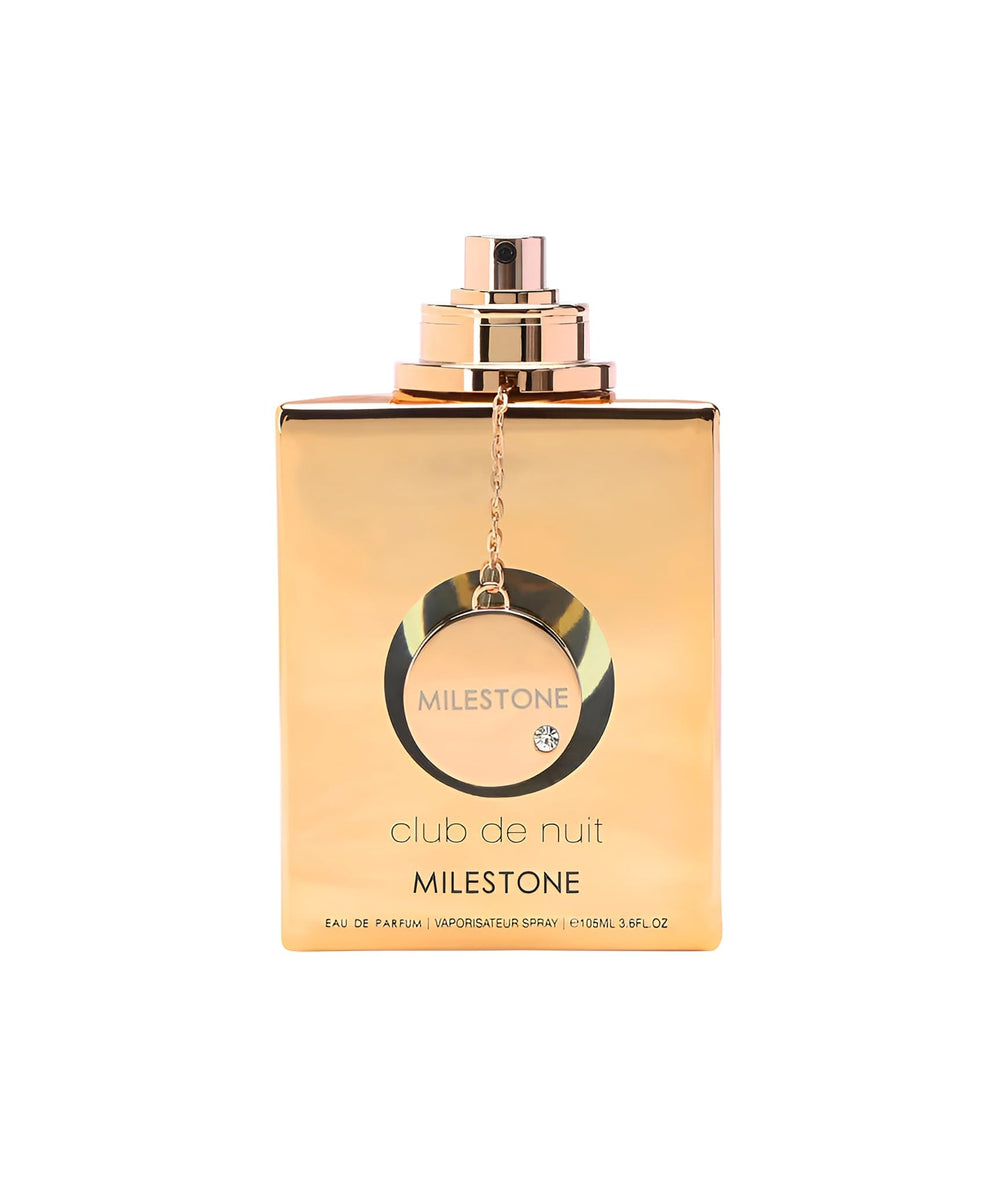 Armaf Club De Nuit Milestone spray bottle in sunlit setting highlights versatile scent.