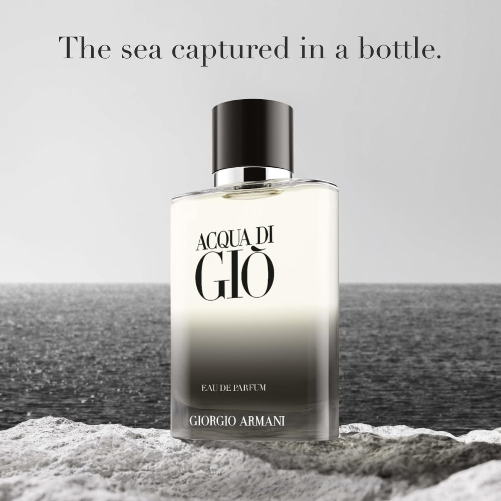 Armani Beauty Acqua di Giò bottle cap close-up emphasizes luxury grip and monogram detail for premium-at-hand experience.