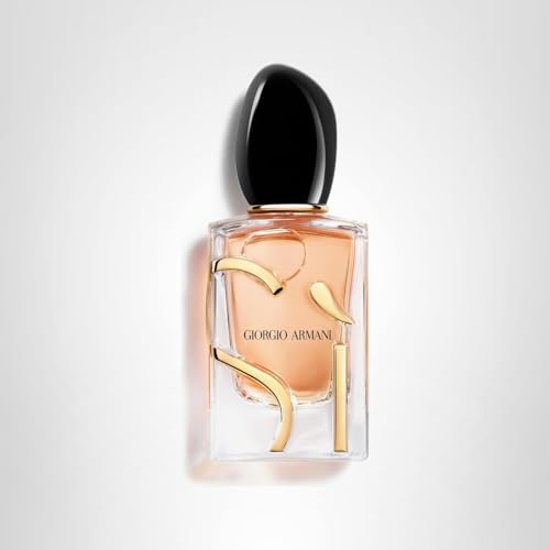 Armani Beauty Sì EDP woman applying fragrance at wrist for date-night aroma