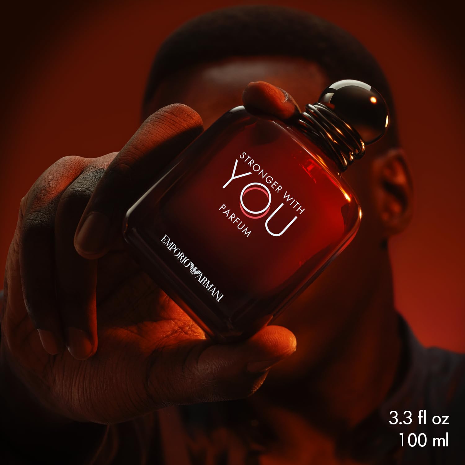 Armani Beauty Stronger With You pulse-points-application shows best use on wrists or neck.