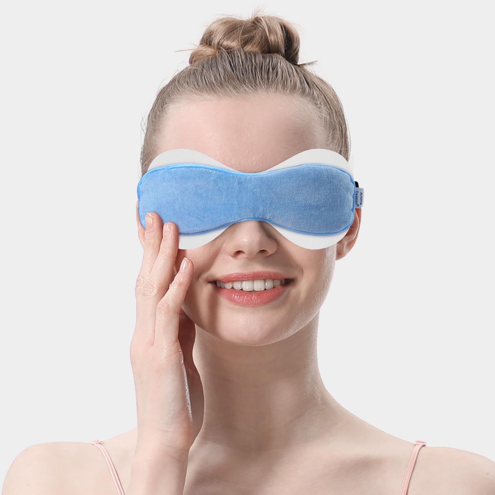 Aroma Season eyelid sheets shaped to fit heated eye masks securely.