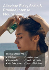 AROMATICA Root Enhancer close-up shows the 6-type Black Food Complex for nourishing scalp care.