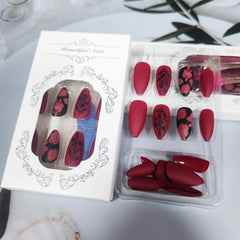 AROVFAM glossy black leaves nails design for versatile everyday wear.