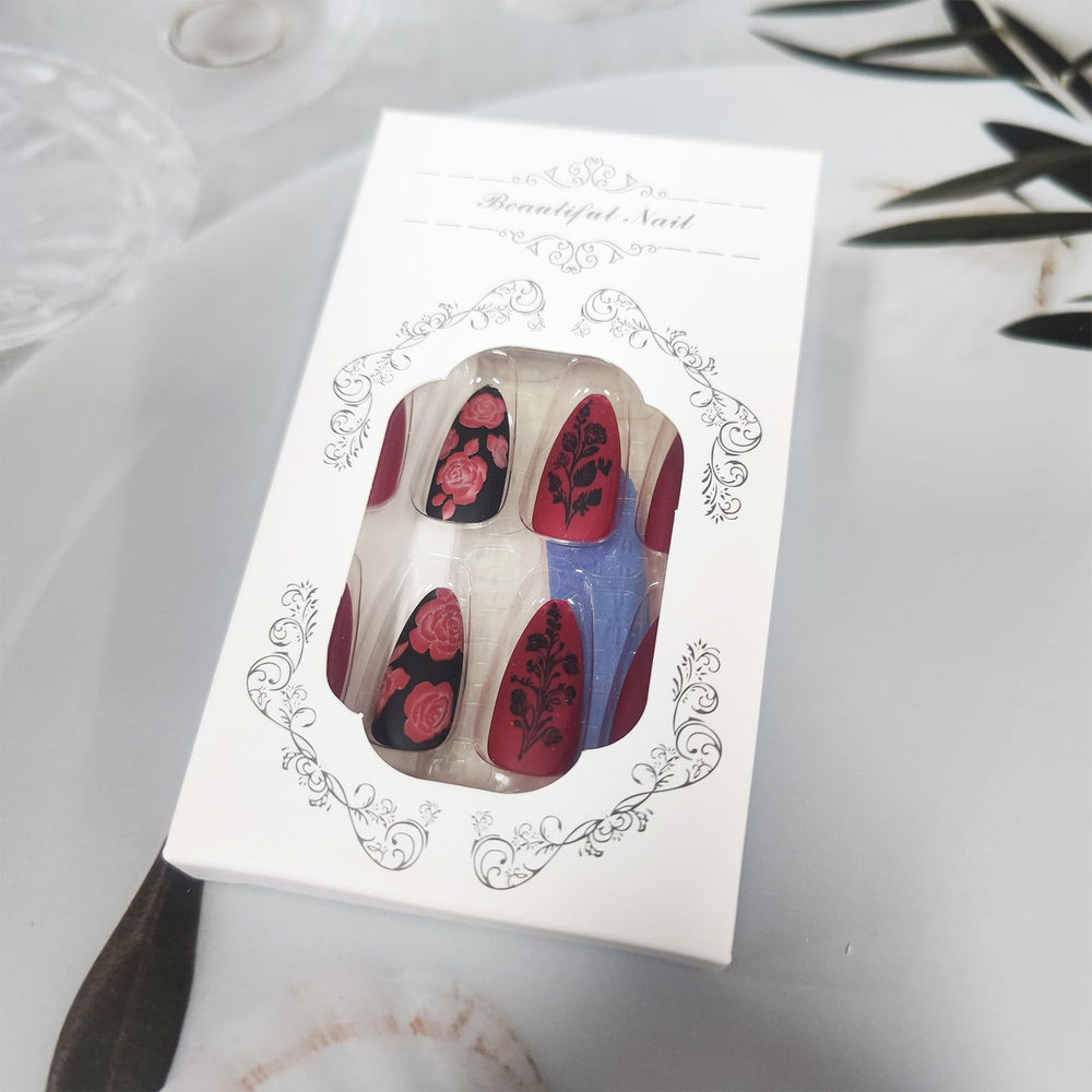 AROVFAM glossy black rose nails with a high shine finish.