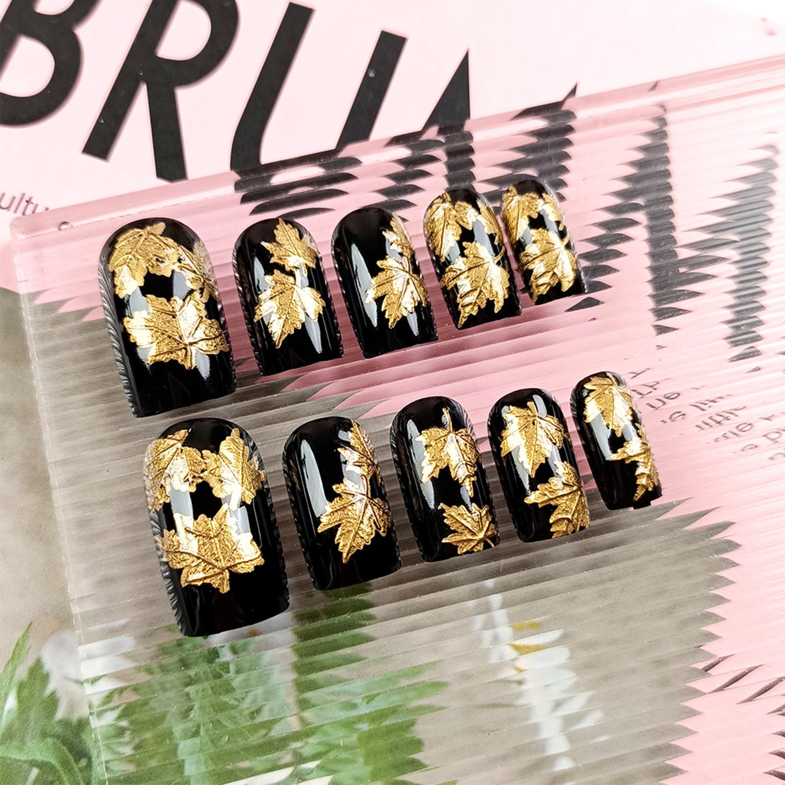 AROVFAM Thanksgiving nails with fall leaves for chic seasonal looks.