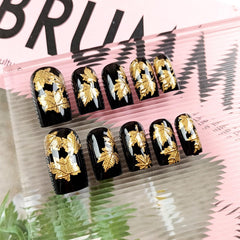 AROVFAM Thanksgiving nails with fall leaves for chic seasonal looks.