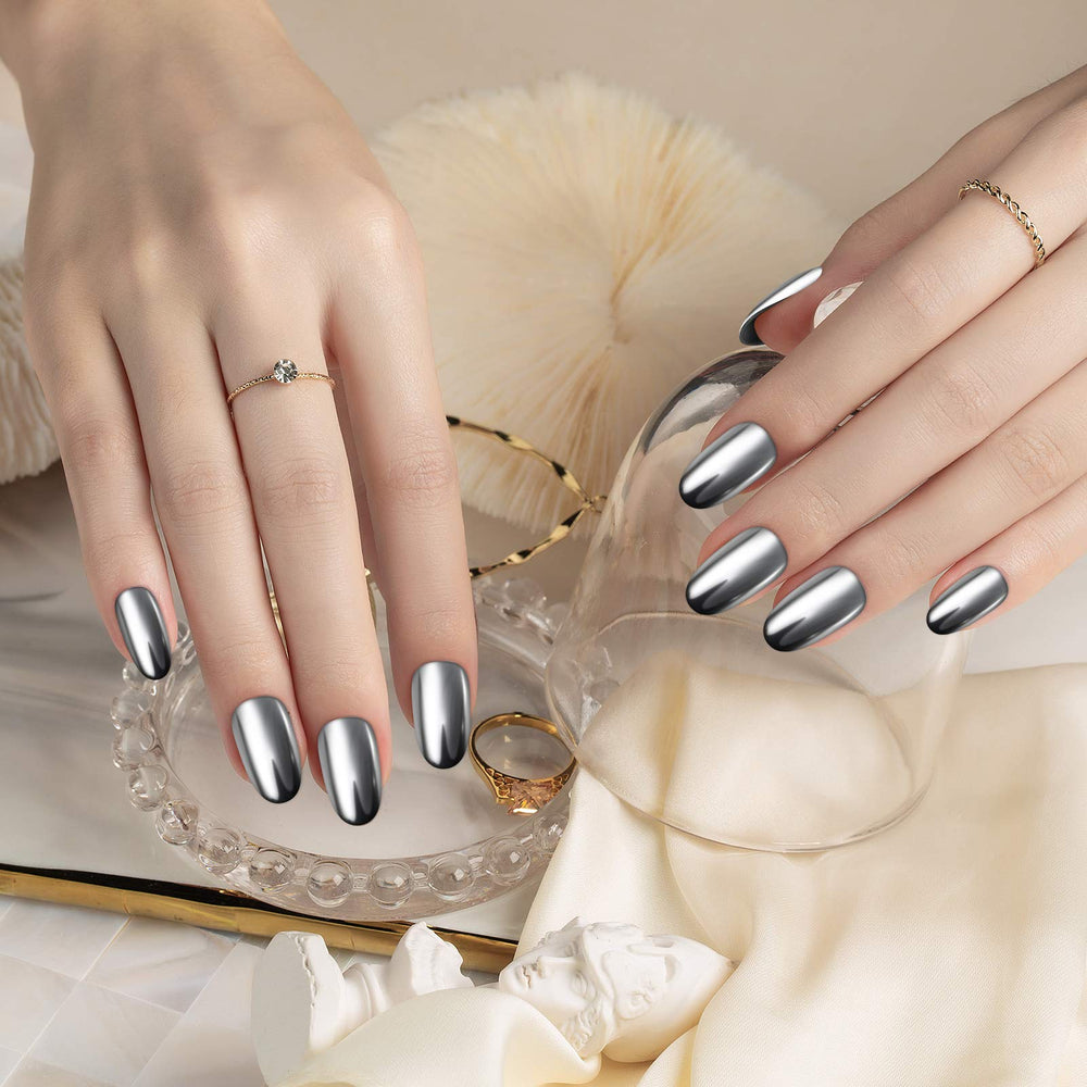 Artdone chrome nail powder on black background shows brightest mirror effect.