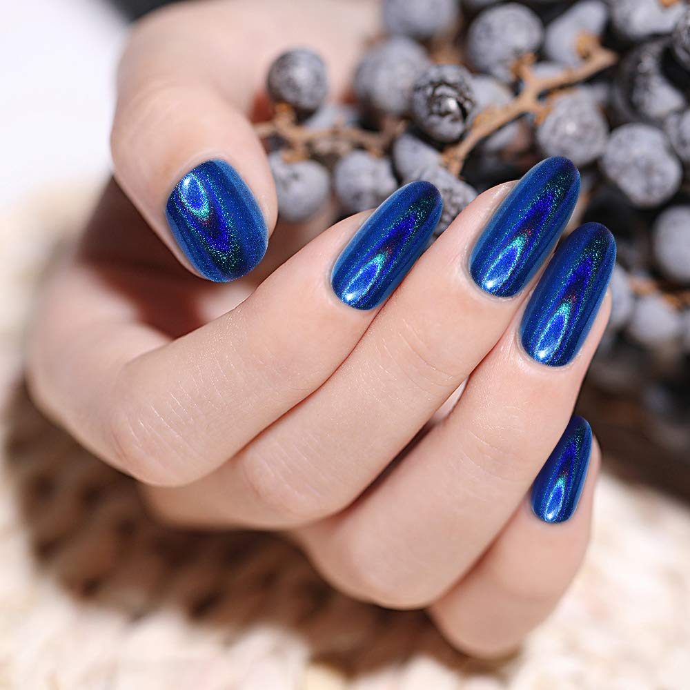 Artdone chrome powder paired with rhinestones for luxe nail art.