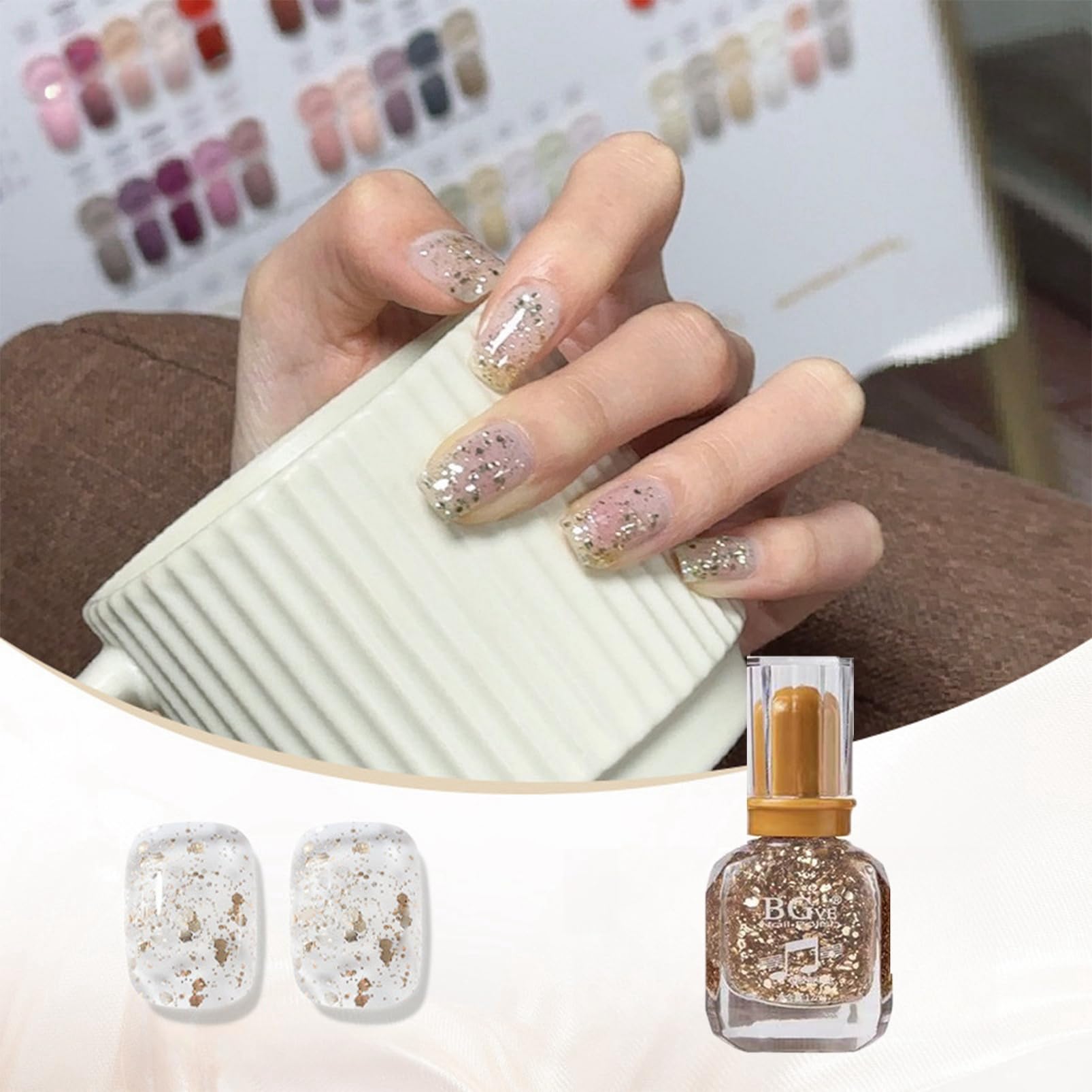 ASMAYSA glossy gold shimmer nail art catches light with high shine.