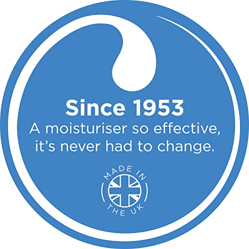 Astral Moisturising Cream application in hands shows smooth spread.