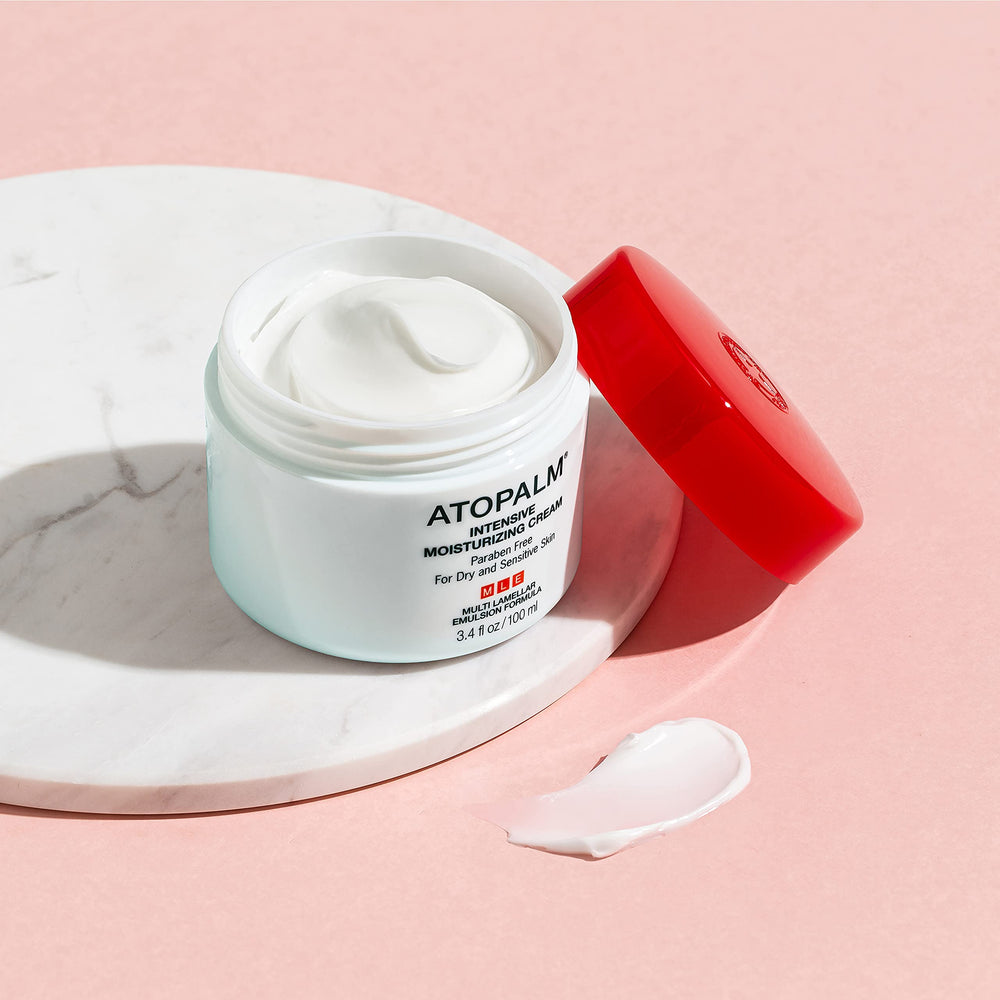 ATOPALM Intensive Moisturizing Cream on face during application for hydration