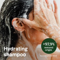 ATTITUDE Hydrating Shampoo bottle pour shows easy application with refreshing peppermint-orange aroma