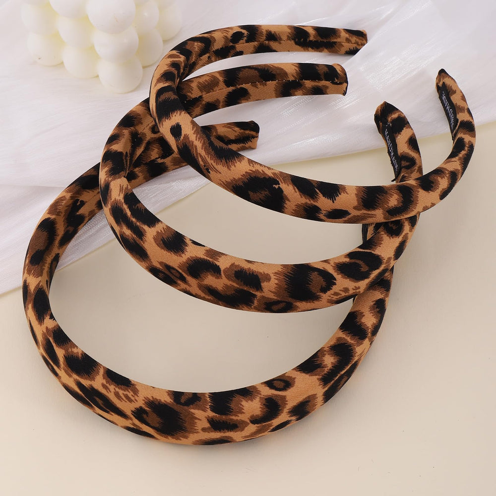 AUDTOPE three-sizes-fit leopard headbands displayed for different looks.