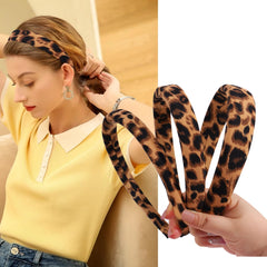 AUDTOPE padded leopard headband close-up highlights comfortable cushioning.