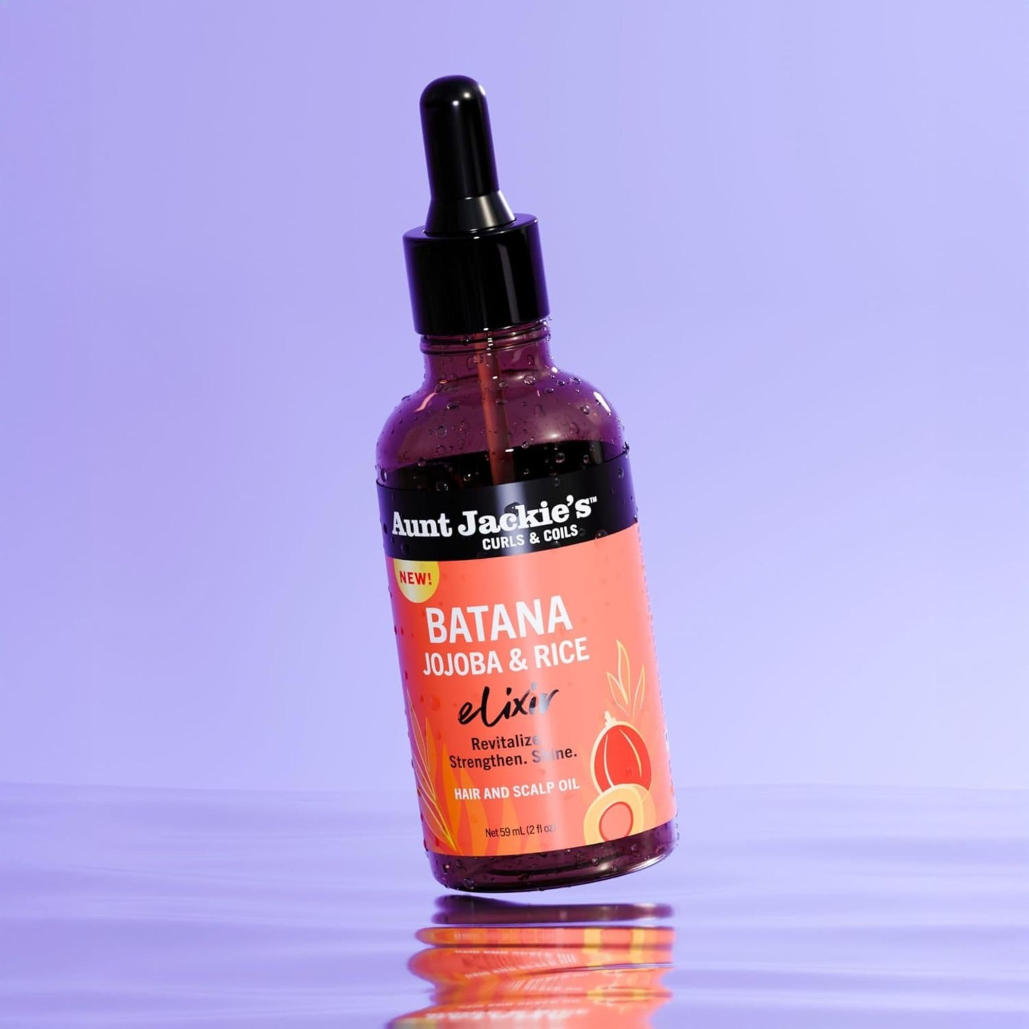 Aunt Jackie's Batana Jojoba Rice Elixir texture close-up—demonstrates non-greasy, lightweight formula