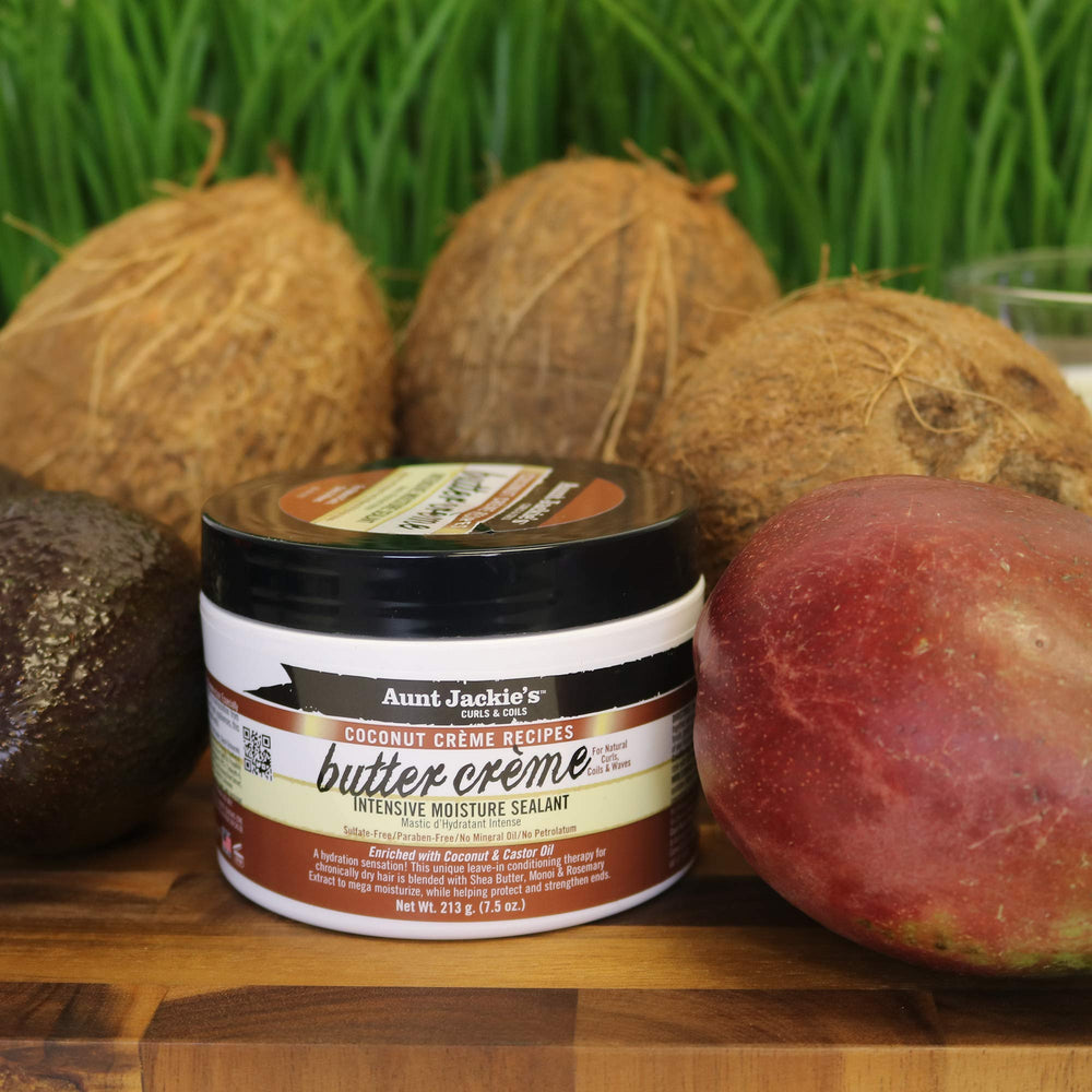 Aunt Jackie's Coconut Creme Butter Creme applied to curly hair for smoother coils.