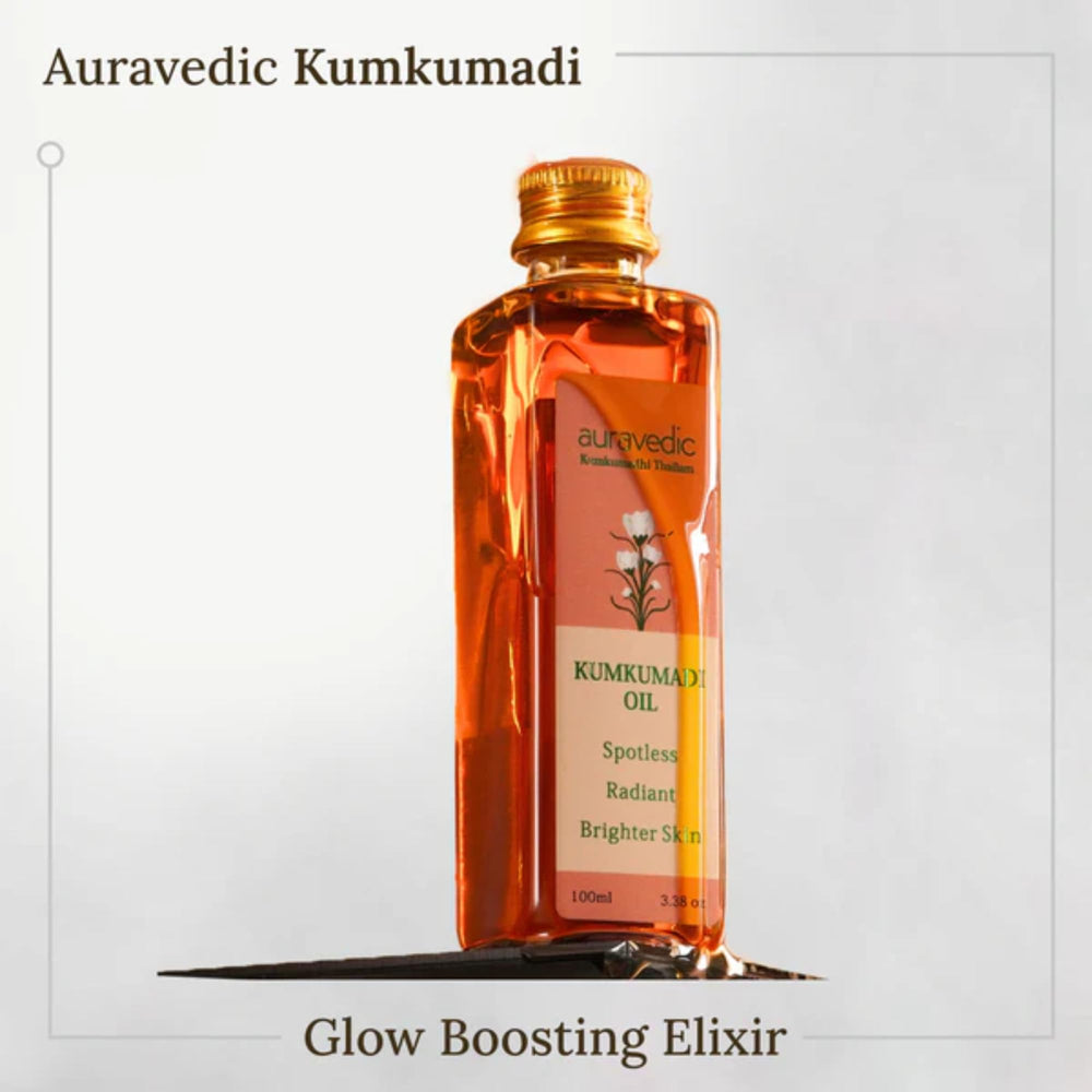Auravedic Kumkumadi Oil being applied to the face for easy layering.