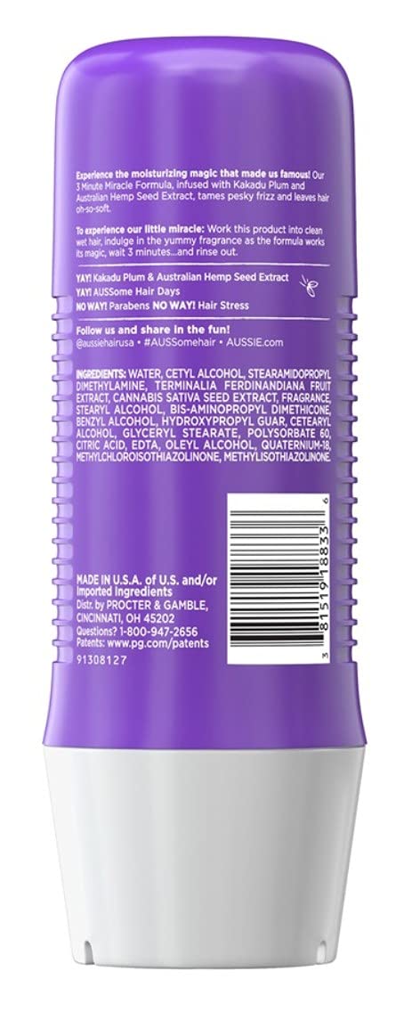 Aussie 3 Minute Miracle Waves conditioner on hair strands aiding detangling and shine