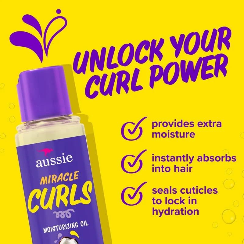 Aussie Miracle Curls oil on curly hair for definition and frizz control.