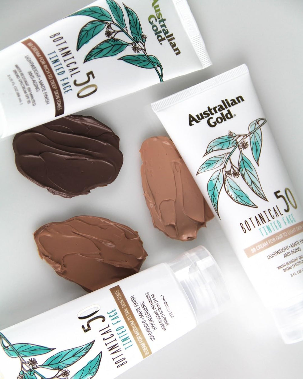 Australian Gold Botanical SPF50 tinted sunscreen texture shows powdery matte finish.