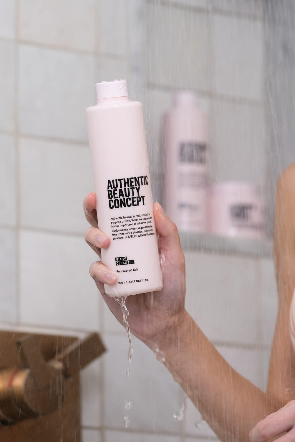 Authentic Beauty Concept Glow Cleanser pump-action shot conveys easy, mess-free use.