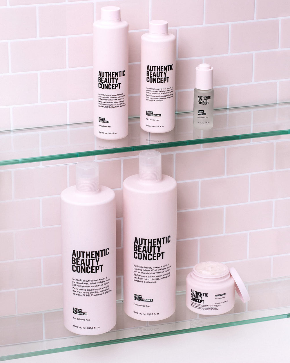 Authentic Beauty Concept Glow Conditioner comb-ready hair on a brush demonstrates detangling ease.