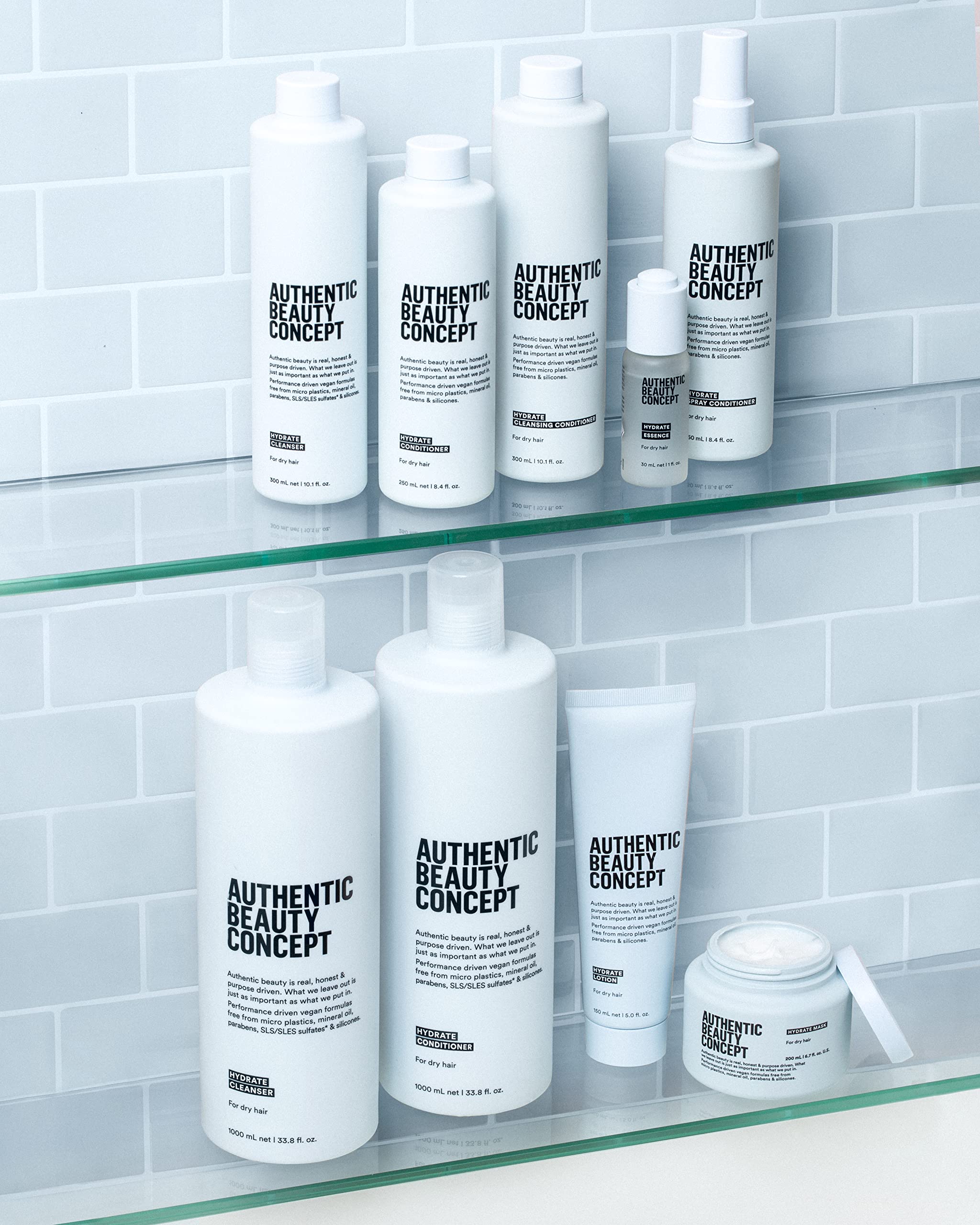 Hydrate Spray Conditioner packaging highlights silicone-free and paraben-free claims.
