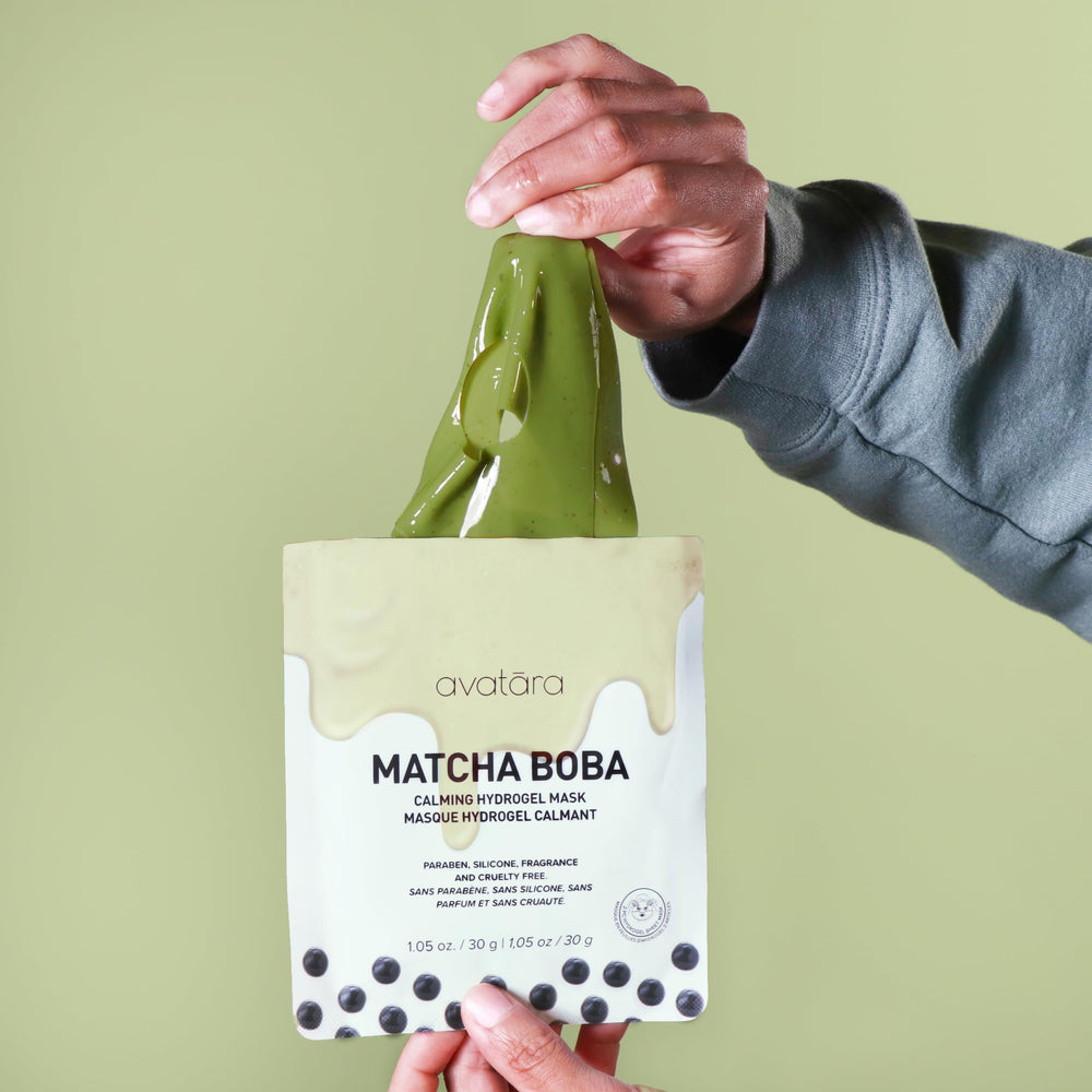 Avatara Matcha Boba Mask close-up with matcha leaves suggests antioxidant-rich nourishment.