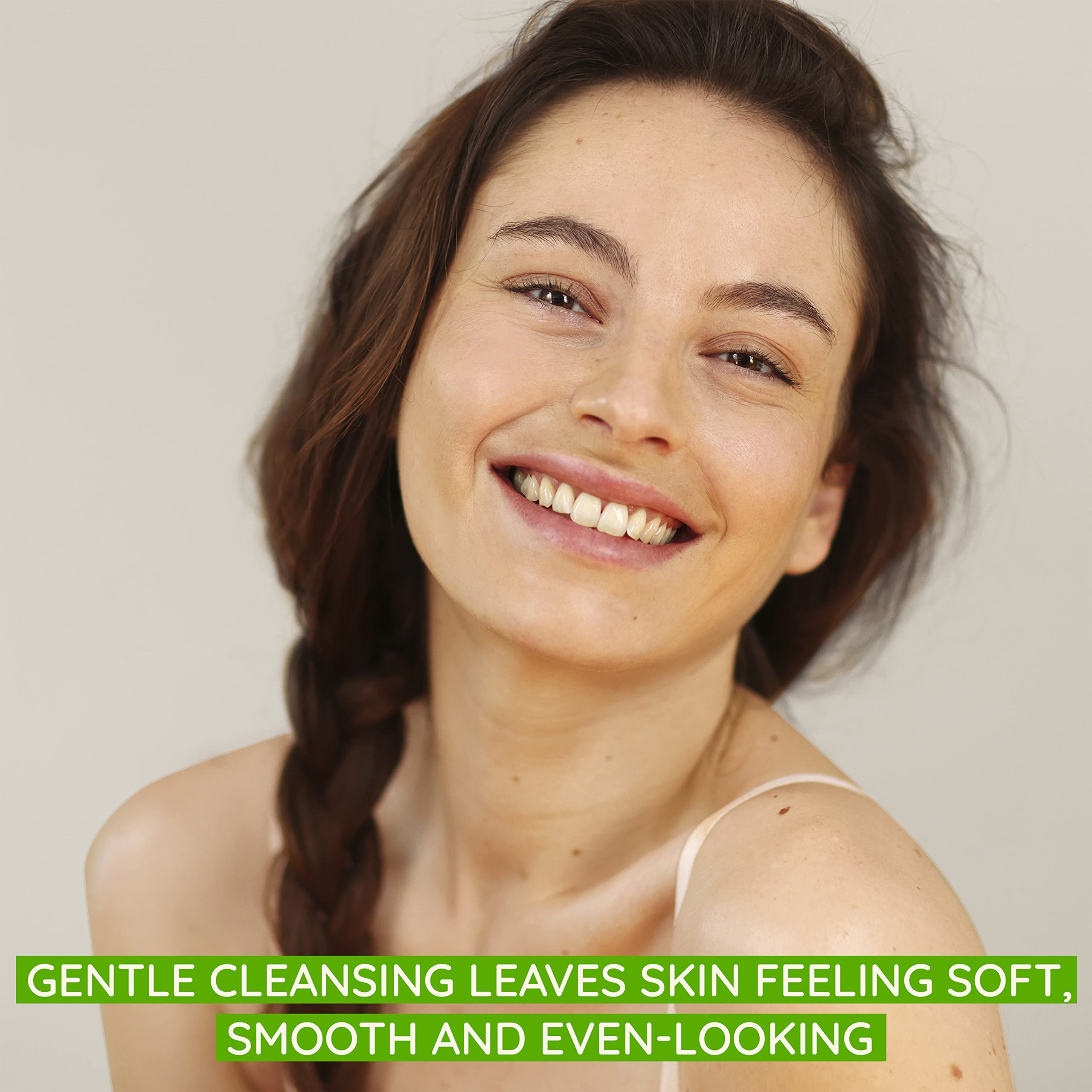 Aveeno Clear Complexion Foaming Cleanser bottle on counter ready for daily use.
