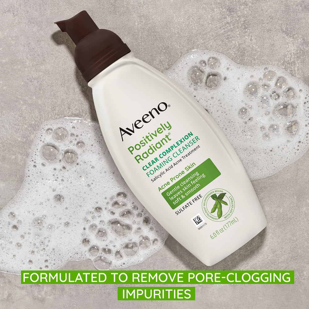 Aveeno Clear Complexion Foaming Cleanser on hand after wash promotes soft, smooth skin.