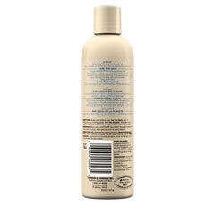 Aveeno Skin Relief Shower & Bath Oil bottle pour demonstrates gentle cleansing and hydration