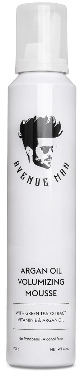 Avenue Man Argan Oil Mousse bottle highlights hydrating formula for silky, frizz-free style.