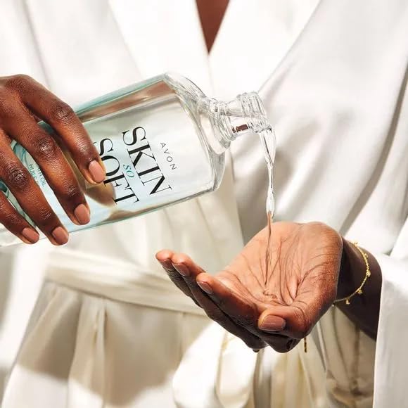 Avon Skin So Soft Original bath oil bottle highlights jojoba oil nourishment for smooth skin.